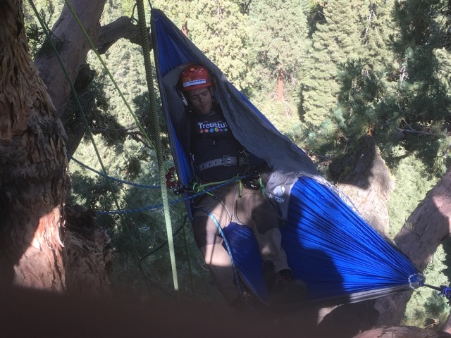 14. On the last couple of nights of the expedition, some of the climbers chose to sleep the night at 200 feet above the ground. This is Nick Bonner.